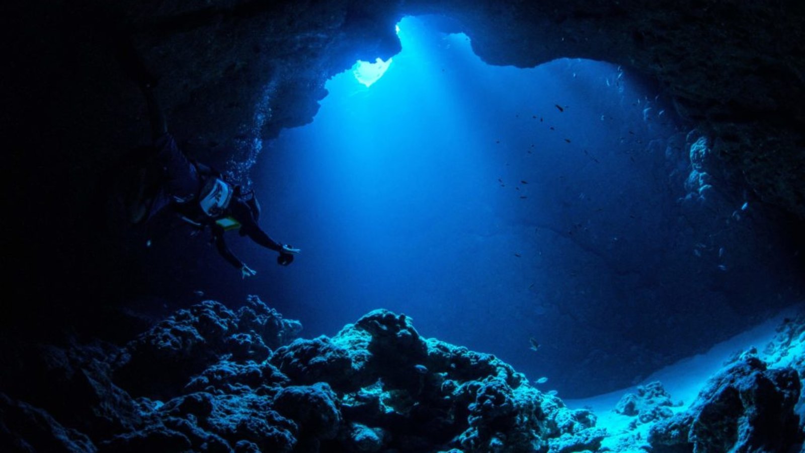 Scuba diver exploring the mysterious Mariana Trench